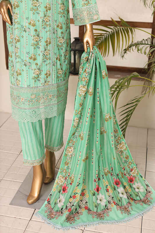 Mint green embroidered outfit with matching dupatta on a tiled floor.
