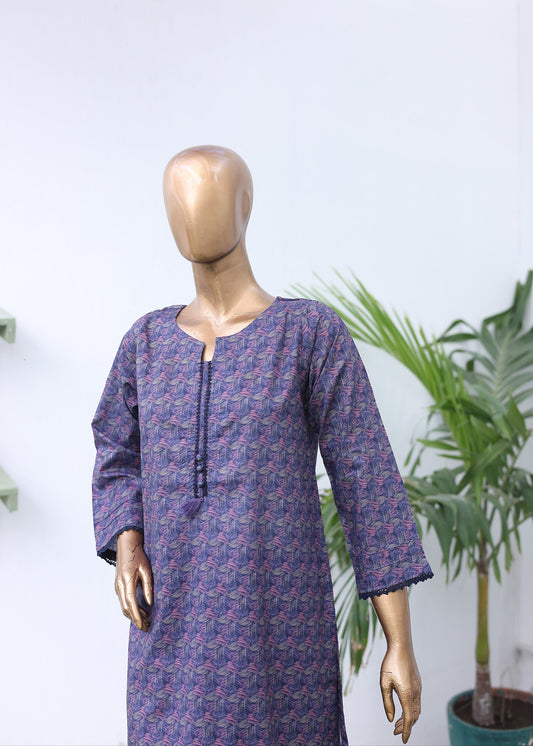 Mannequin wearing a patterned outfit with a white background