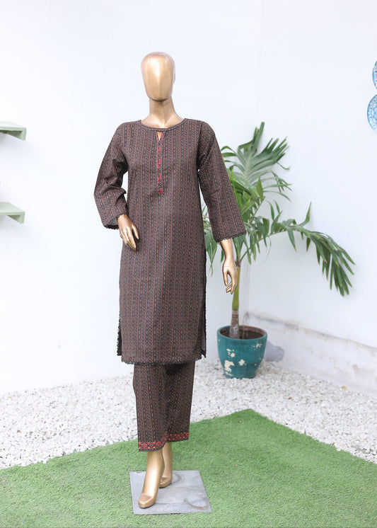 Mannequin wearing a brown outfit with a plant on a white background