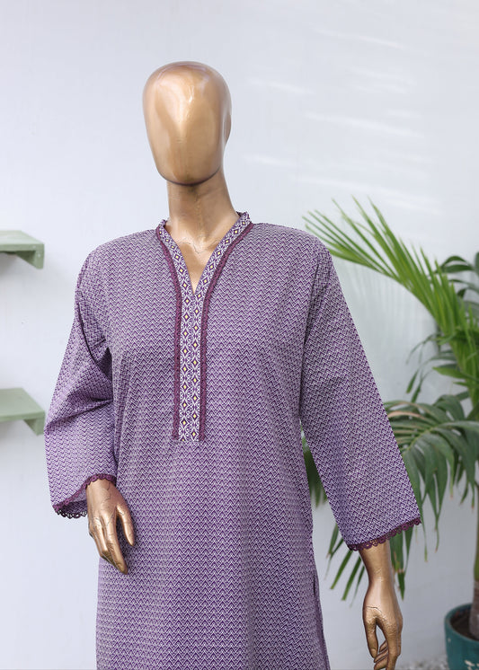 Purple textured dress on a mannequin with a white background