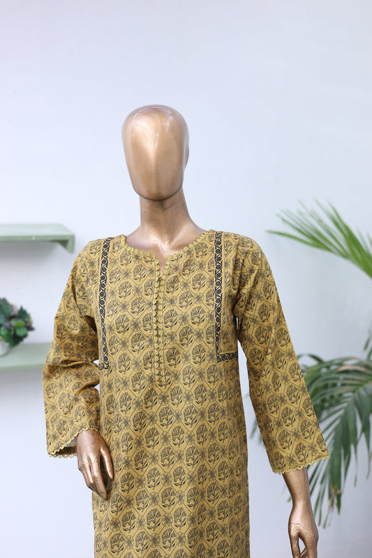 Mannequin wearing a yellow patterned outfit with a white background