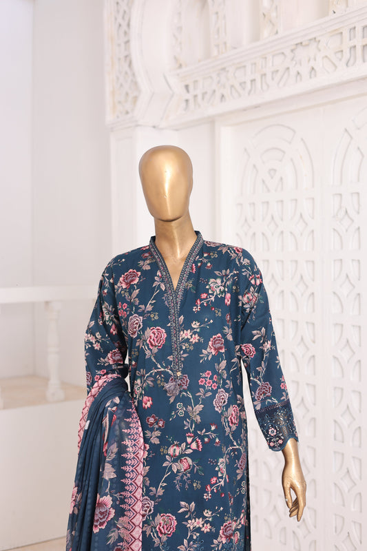 Mannequin wearing a blue floral dress against a white decorative wall.