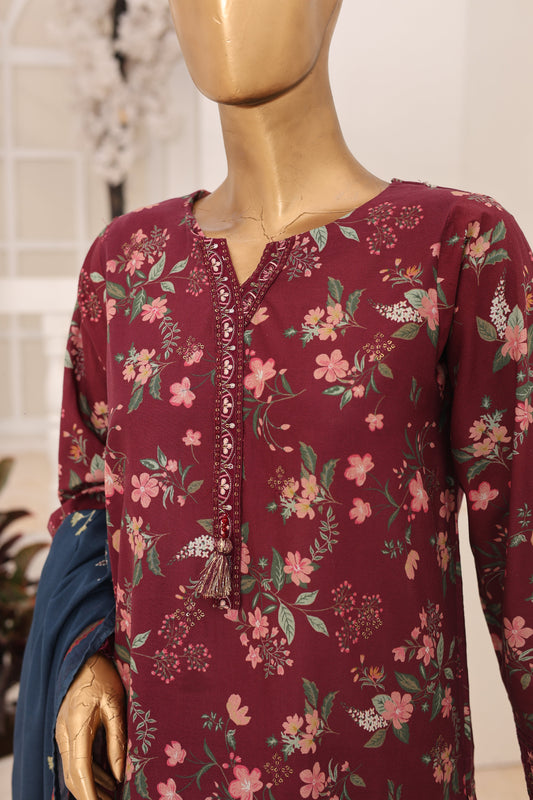 Maroon floral dress on a mannequin against a neutral background