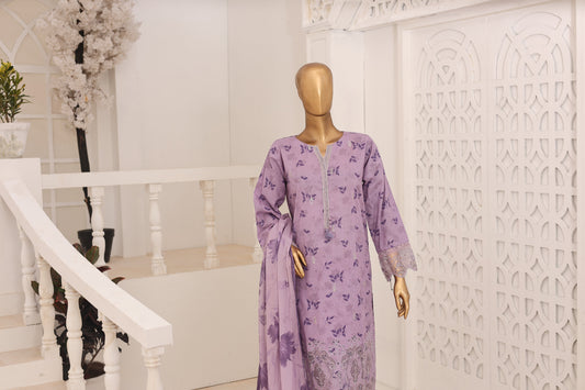 Mannequin wearing a purple dress with floral patterns in a decorative interior setting.