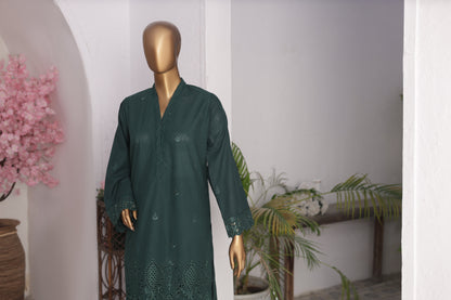 Mannequin wearing a dark green traditional outfit with floral patterns in an indoor setting.