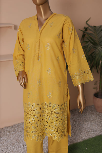 Yellow embroidered kurta on a mannequin against a neutral background