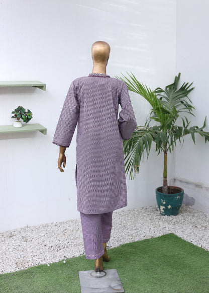 Mannequin wearing a purple outfit with a white background and plants.