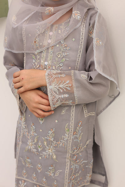 Gray embroidered fabric with floral patterns on a white background