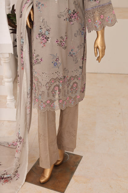 Mannequin wearing a floral embroidered outfit with beige pants on a light background