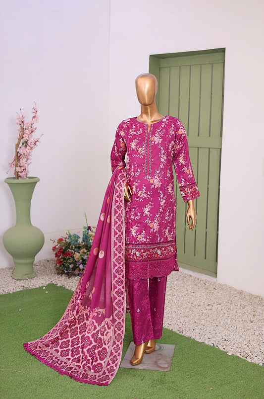 Mannequin wearing a pink embroidered traditional outfit with a matching dupatta in a room with a green door and decorative items.